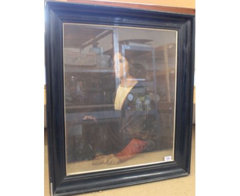 A large framed print of a young gentleman