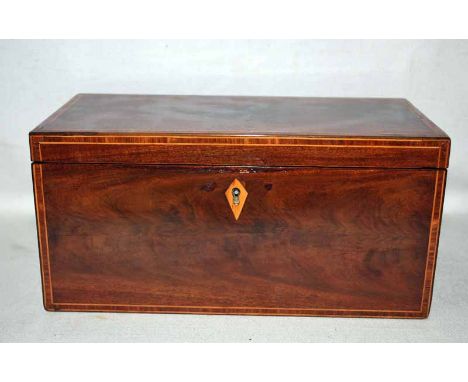 A 19th century line inlaid mahogany Tea Caddy of rectangular form, hinged lid enclosing a central glass mixing bowl - not ori