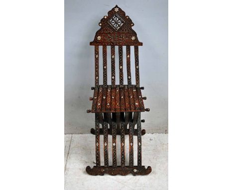 An eastern mother of pearl inlaid Savonarola style folding Chair, X pattern, 42cm high 