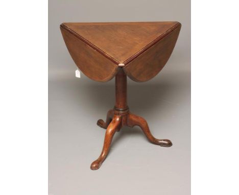 A GEORGIAN MAHOGANY TRIPOD TABLE, third quarter 18th century, the circular top with three fold down flaps on rotating mechani