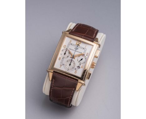 A GENTLEMAN'S 18CT GOLD GIRARD-PERREGAUX "VINTAGE 1945" AUTOMATIC WRISTWATCH, the oblong dial with applied metal Arabic numer