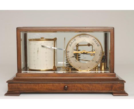 A MAHOGANY CASED BAROGRAPH retailed by Manoah Rhodes &amp; Sons, Bradford, with silvered dial and eight vacuum sections, the 