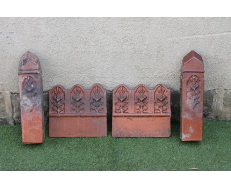 A LARGE COLLECTION OF VICTORIAN SALTGLAZE STONEWARE GARDEN EDGING TILES, approximately sixty five, each tile with waved crest