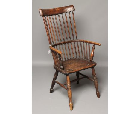 AN ASH AND ELM COMB BACK WINDSOR ARMCHAIR, early/mid 19th century, possibly Lincolnshire, plain stay rail, baluster turned ar