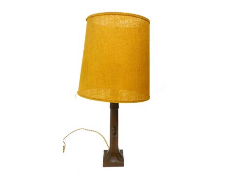 A Robert "Mouseman" Thompson oak table lamp of octagonal form with carved mouse signature and bakelite light fitting. Height 