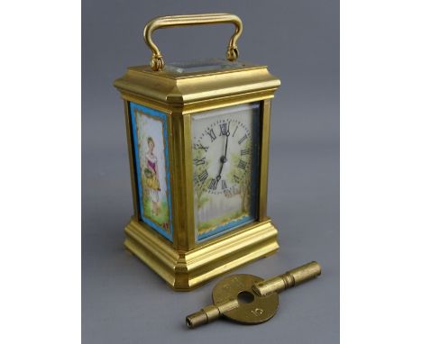 A FRENCH MINIATURE BRASS & PORCELAIN ENAMEL CARRIAGE CLOCK set with Roman numerals, the movement backplate numbered 3006, 9 c