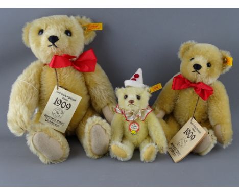 TWO STEIFF 1909 REPLICA TEDDY BEARS & A CLOWN BEAR, button in ear yellow tag nos. 406225, 406201 and 029387, 33 cms, 24 cms a