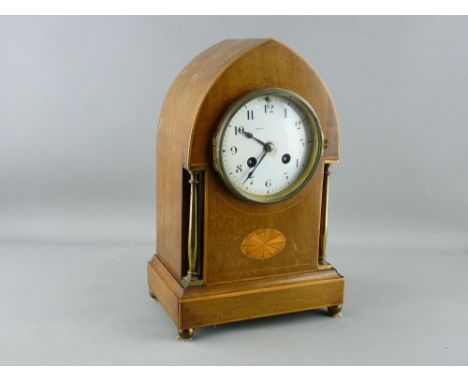 A LANCET TOP INLAID MAHOGANY MANTEL CLOCK having brass pillar decoration and ball feet, the French movement stamped 'R & Co' 