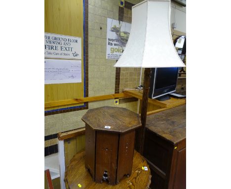 A VINTAGE OAK STANDARD LAMP & SHADE and an Arts & Crafts style octagonal top oak table, 39.5 cms high 38 cms wide the table