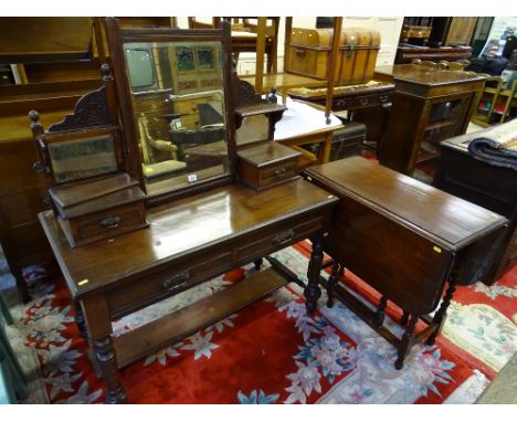 AN EDWARDIAN MIRRORED DRESSING TABLE with under tier shelf and an oak twin flap barley twist gate leg table (various measurem