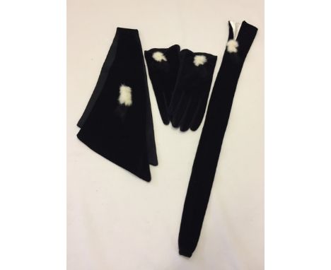 A vintage ladies black velvet evening accessories set with rabbit fur detail. Comprising gloves, scarf /collar and parasol co