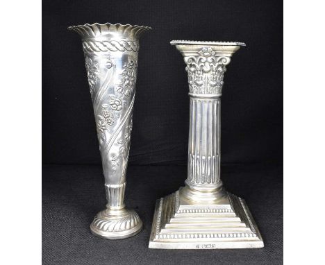 An Edwardian short single candlestick in the form of a Corinthian column, on stepped square weighted base, Fordham &amp; Faul