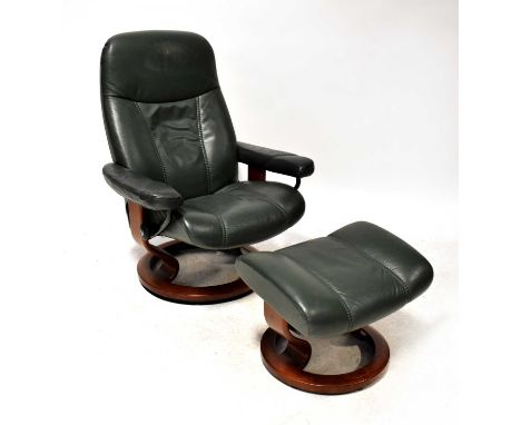 EKORNES; a stressless leather armchair in green with matching footstool.Condition Report: Overall solid but used condition, s