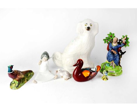 Various ceramic animals and figures comprising a Poole pottery duck, a Beswick model of a pheasant no.1226, a Nao duck, Beswi