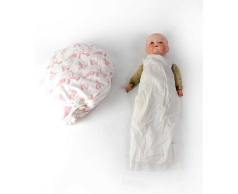 ARMAND MARSEILLE; a bisque head doll, no.341/4, with sleepy eyes and closed mouth, cloth body with celluloid hands, height 40