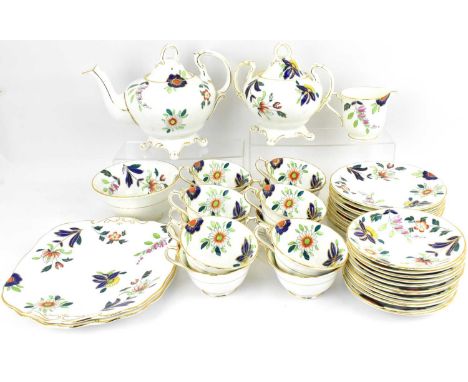 A forty-two piece Victorian tea set decorated in the Imari colours of gilt-heightened cobalt blue, yellows and orange floral 