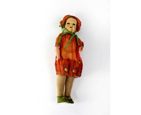 An early/mid 20th century German bisque head doll with closed mouth, open-and-shut eyes, mohair hair and fabric body, in orig