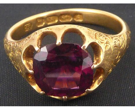 An 18ct gold amethyst ring with claw set square cut amethyst, with patterned shoulders, size R, approx. 8g.Condition Report: 