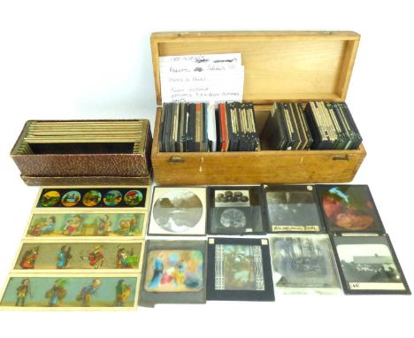 A wooden box of magic lantern slides and a box of twelve children's coloured lantern slides (2).