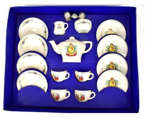 A Queen Elizabeth II 1950s Corona Coronation tea set comprising teapot, height 10cm, four cups, four saucers, four small plat