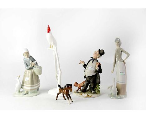 Various ceramics comprised of a Beswick foal, two Lladró figures of women with geese, a Capodimonte figure of a suited man wi