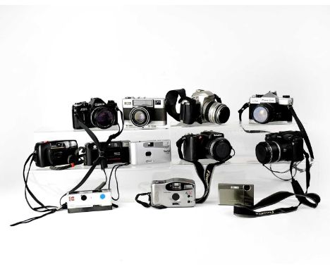 A collection of film cameras to include a Canon AE1, a Minolta AF-E, a Fujica 35 Auto-M, etc.