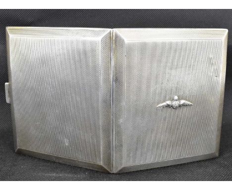 A George V hallmarked silver square cigarette case with RAF wings to the front and all-over engine turned decoration, W H Has