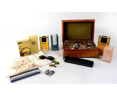 A leather jewellery box containing a quantity of vintage costume jewellery, necklaces, chains, brooches, pendants, earrings, 