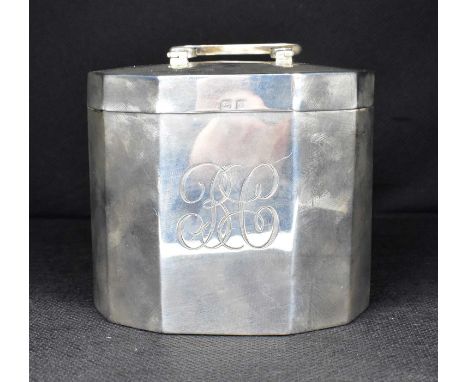 A George V hallmarked silver tea caddy of lozenge shape with initials BC to the front, William Neale, Birmingham 1913, height