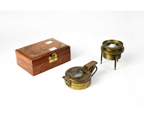 A T.G. &amp; Co Ltd military 1941 compass, contained in cedarwood box with brass anchor to the top.