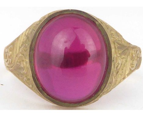 A vintage 9ct gold ring with oval bezel set ruby, size U, approx. 3.4g.