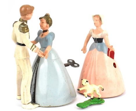 WELLS BRIMTOY; two vintage clockwork figures comprising Mary with lamb and Cinderella with Prince, height of each approx. 12c