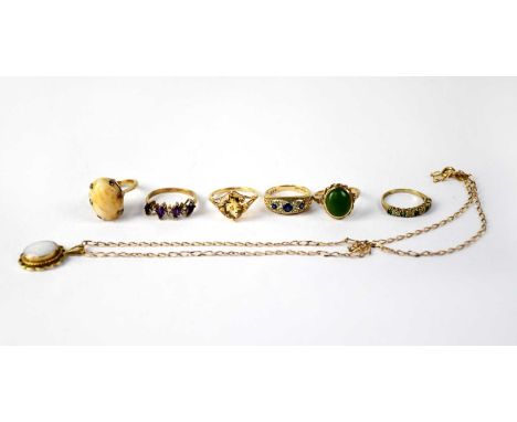 Six 9ct yellow gold rings set with various stones and a 9ct yellow gold pendant necklace set with an opal, combined approx. 2