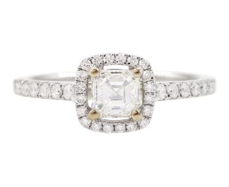 18ct white gold diamond halo cluster ring, the principal asscher cut diamond of 0.39 carat, with round brilliant cut diamond 