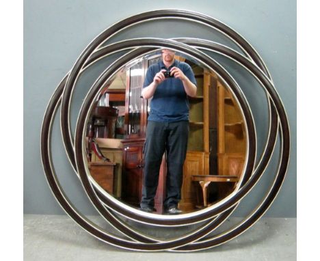 R V Astley circular mirror with stylised pierced wooden frame