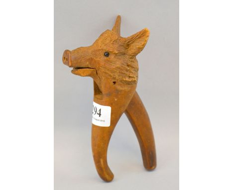 Black forest style nut cracker in the form of a boarDamage and loss to lower jaw