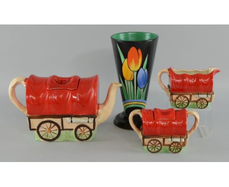 A group of Art  Deco ceramics  to include an unusual gypsy caravan teapot with sugar and milk jug by Sadler, a Susie Cooper p