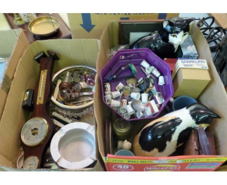 Two boxes of miscellaneous including barometer, thimbles, cutlery, German ash tray, pair of cat models, Sparkling Mike walkin