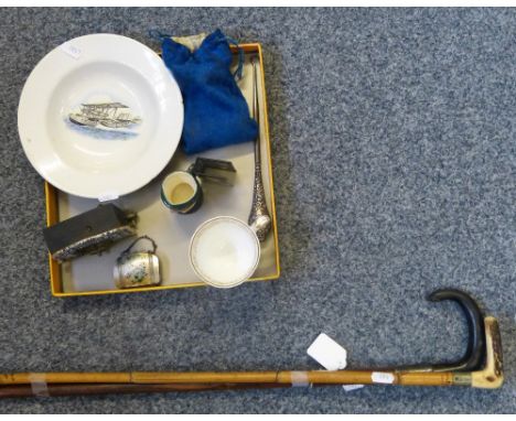 A walking stick together with a crop and a box of collectables including Shelley dish, Copeland cup, glasses, Lord Kitchener 
