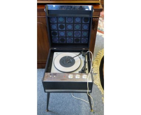 A Dansette Bermuda record player, serial number 7415 type M, on screw in tapering legs (AF)