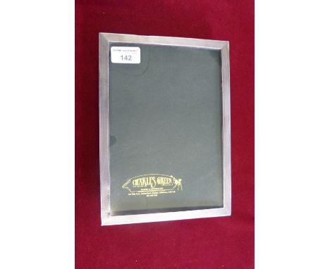 A silver rectangular photograph frame Birmingham 1927 with engine turned decoration, 25 x 18cm