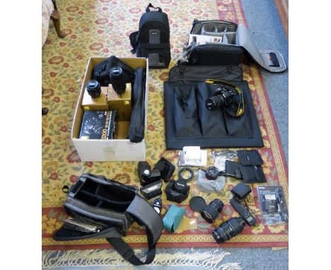 Camera equipment - a little-used Nikon D3200 digital SLR together with monopod, tripod, lighting equipment including light bo