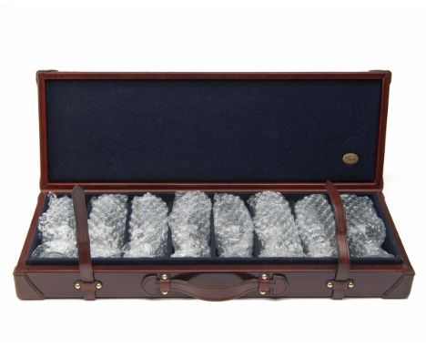 REY PAVON A NEW AND UNUSED HONEY LEATHER-CASED SET OF EIGHT PORT GLASSES, partitioned case lined with red baize, leather carr