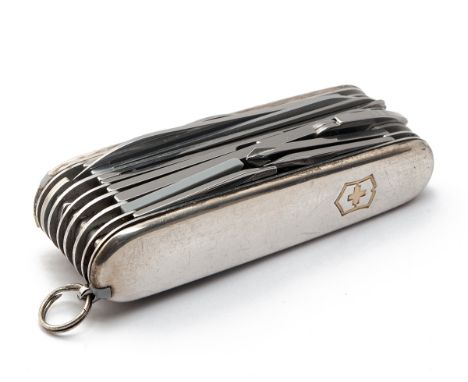 VICTORINOX FOR TIFFANY, NEW YORK A SILVER AND GOLD MOUNTED MULTI-BLADED KNIFE, comprising of 20 separate blades or utensils, 