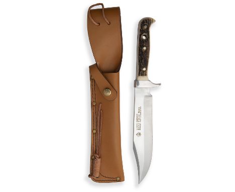 PUMA, GERMANY A CASED STAG-HANDLED BOWIE-KNIFE, MODEL '6376 PUMA BOWIE', serial no. 47192, for 1991, with 8in. bowie blade fa