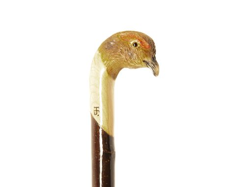 IAN JAMES A FINE NEW AND UNUSED HAND CARVED SPORTSMAN'S STAFF, measuring approx. 51in. in length, with hard wood shaft, the t