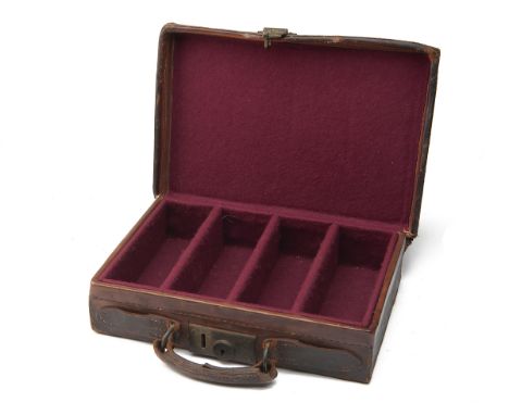 A RARE SMALL LEATHER CARTRIDGE MAGAZINE, possibly for rifle ammunition, the interior lined with maroon baize, three fixed div