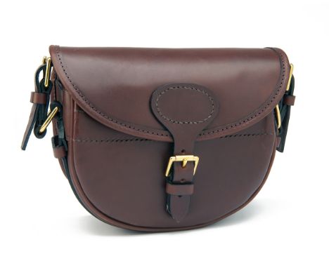 JOANNE YORATH A NEW AND UNUSED LEATHER CARTRIDGE BAG, with canvas and leather shoulder strap and brass fittings. ï¾† Please n