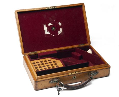 A SCARCE OAK REVOLVER CASE, originally for a 6in. barrelled .455 Webley Wilkinson, measuring externally 13 1/4in. x 8in. x 2 