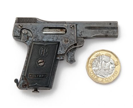 A RARE 2.7mm (KOLIBRI) SEMI-AUTOMATIC VEST-PISTOL SIGNED 'F.P.', MODEL 'KOLIBRI', serial no. 10, circa 1915, with smoothbore 
